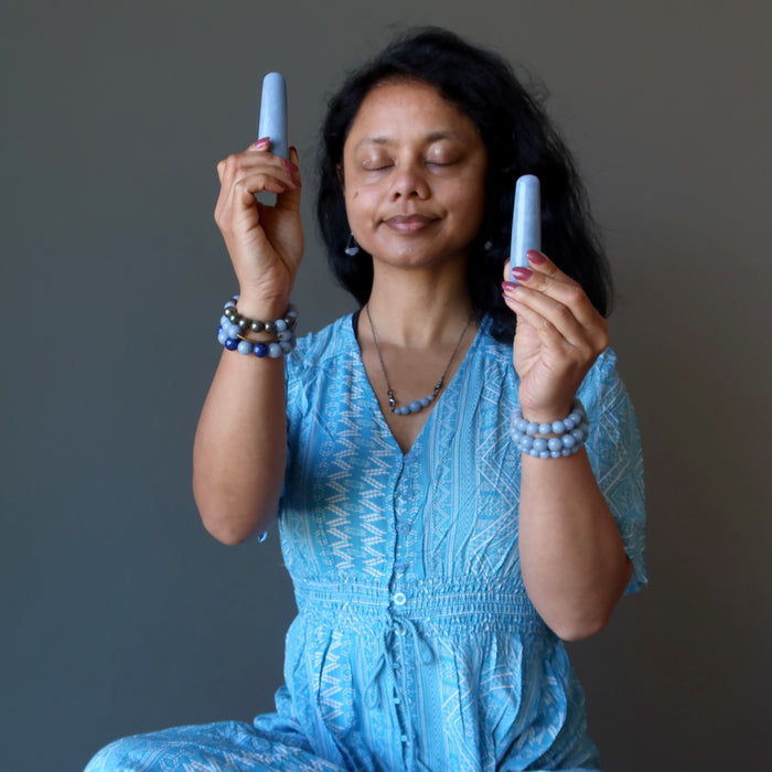 sheila of satin crystals meditating with blue angelite wands
