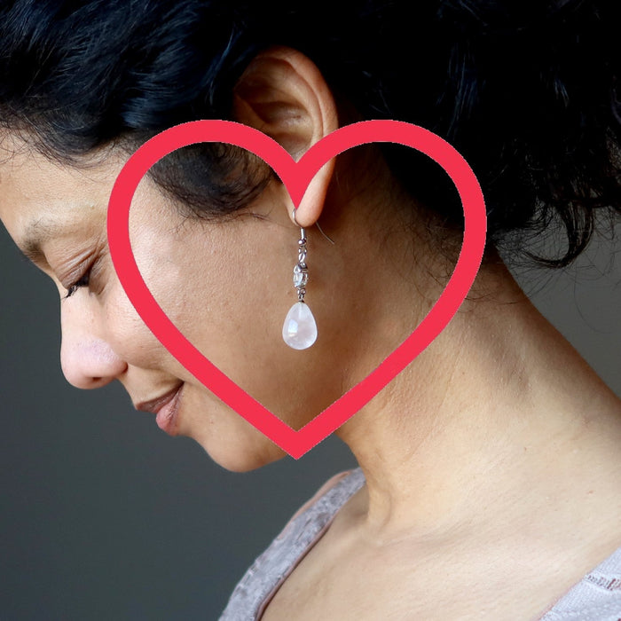 woman wearing rose quartz earrings 