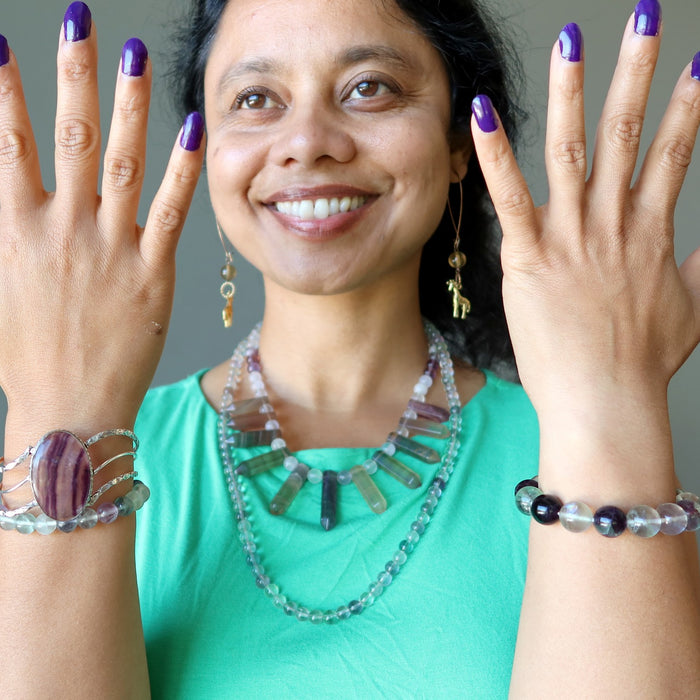 sheila of satin crystals wearing fluorite bracelets, earrings, necklaces