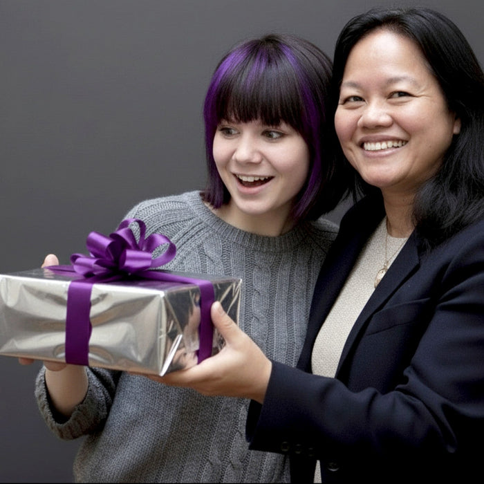 woman and teenager with gift box