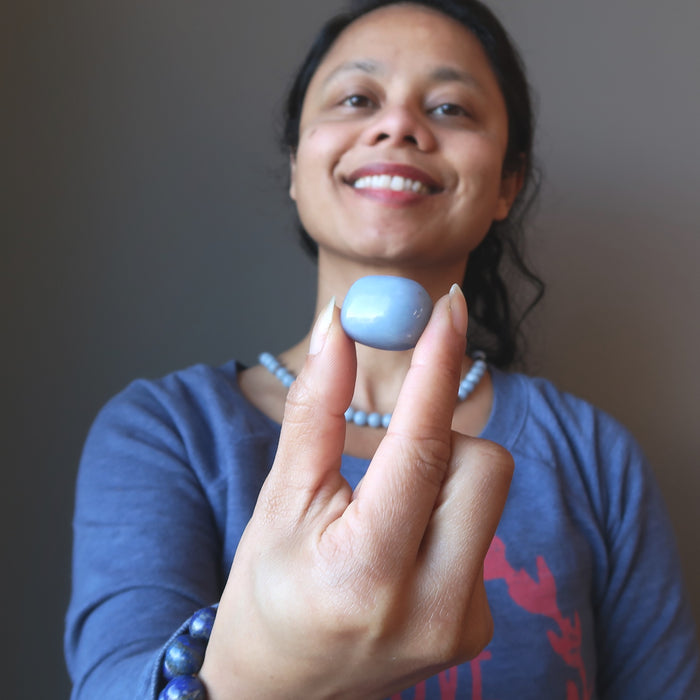 satin crystals holding blue angelite tumbled stone for throat chakra