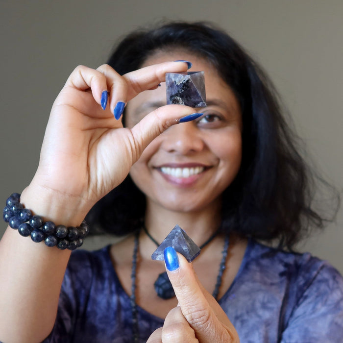 woman with iolite pyramids