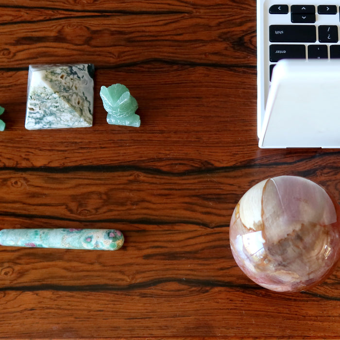 job crystals around a laptop