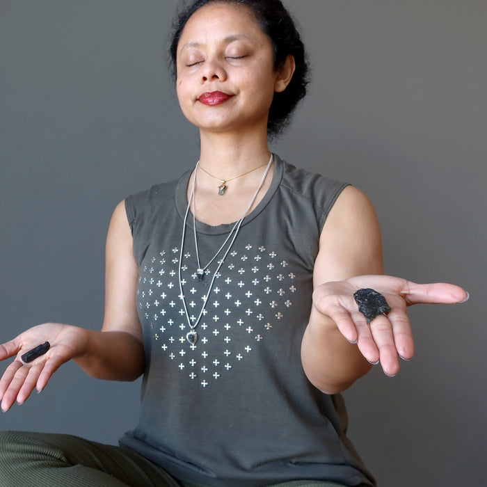 sheila of satin crystals meditating with moldavite