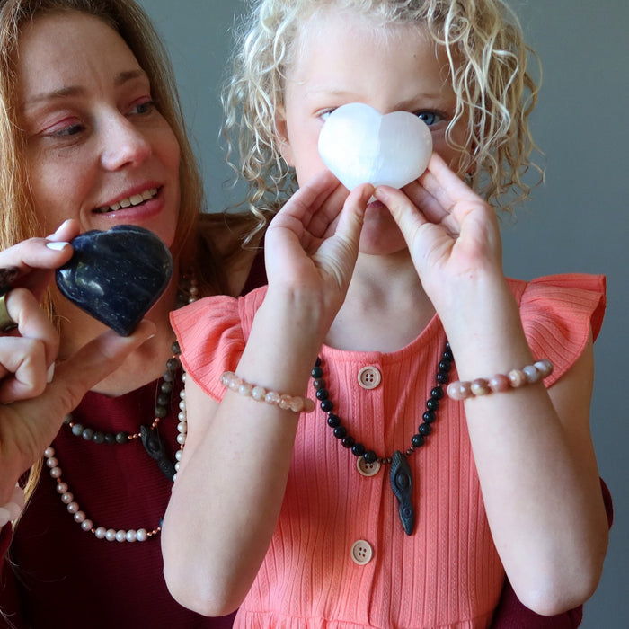 mother and daughter with crystal hearts