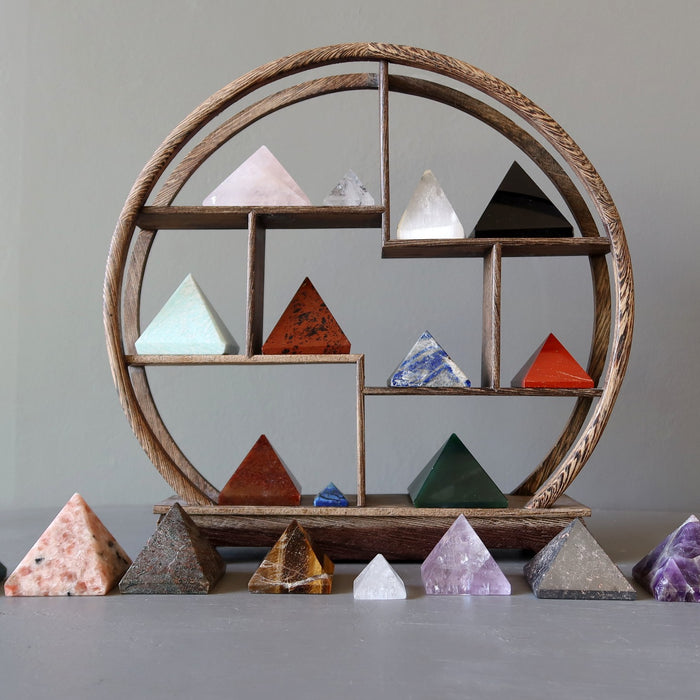 assortment of gemstone pyramids
