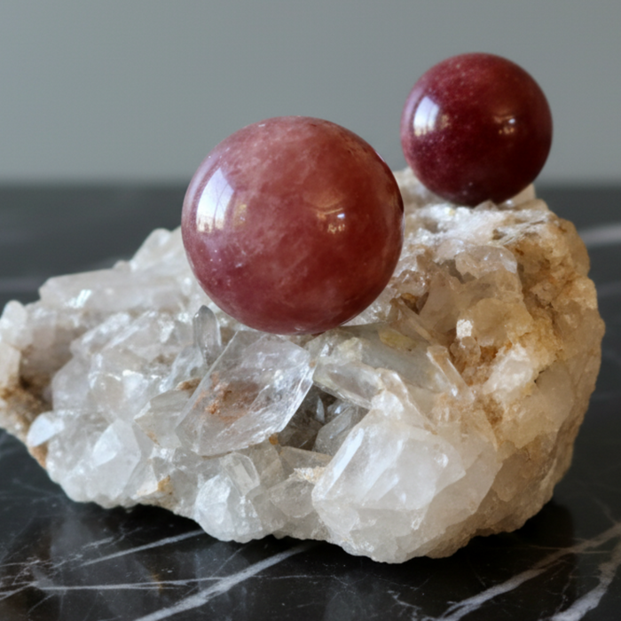 quartz cluster with strawberry quartz spheres