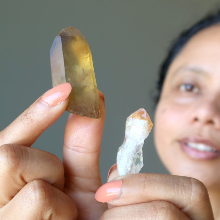 sheila of satin crystals holding real and heat treated citrine points