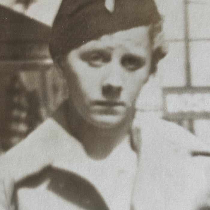 Vintage Postcard WW2 RPPC Military Uniform Soldier Hosiery Street Sign Portrait