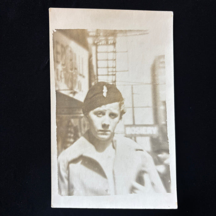Vintage Postcard WW2 RPPC Military Uniform Soldier Hosiery Street Sign Portrait