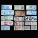 Collection of vintage banknotes from various countries displayed on a black background.