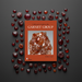 Book cover of 'Collector's Guide to the Garnet Group' with a garnet crystal image on an orange background.