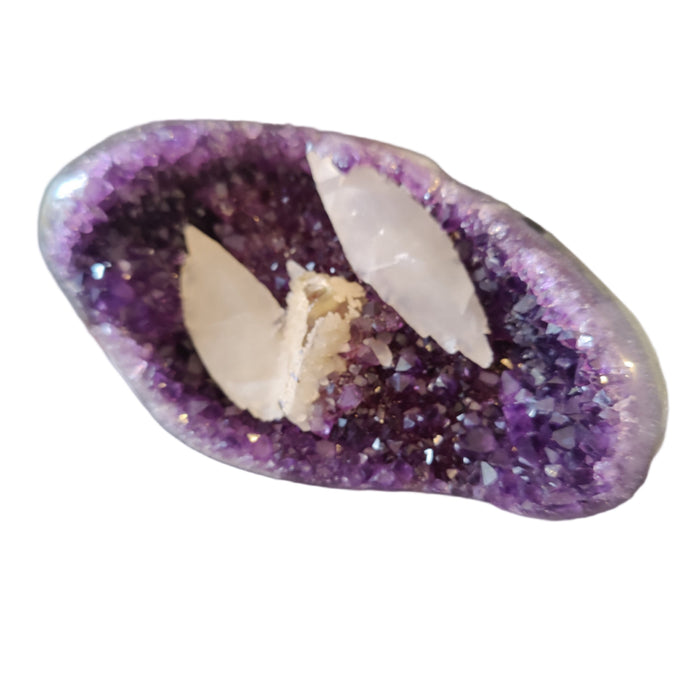 Amethyst crystal with white calcite interior