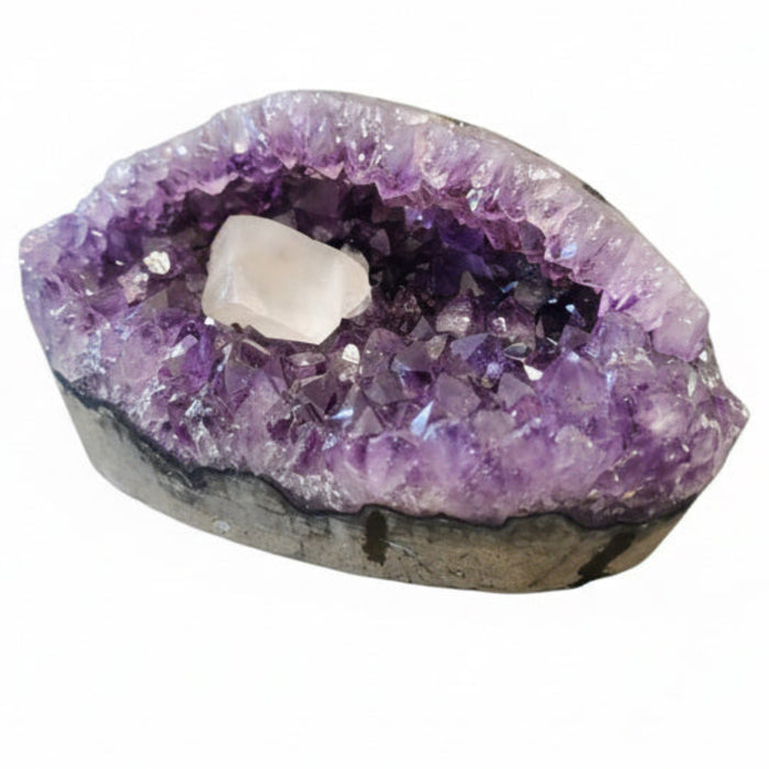 Amethyst crystal on a gray background