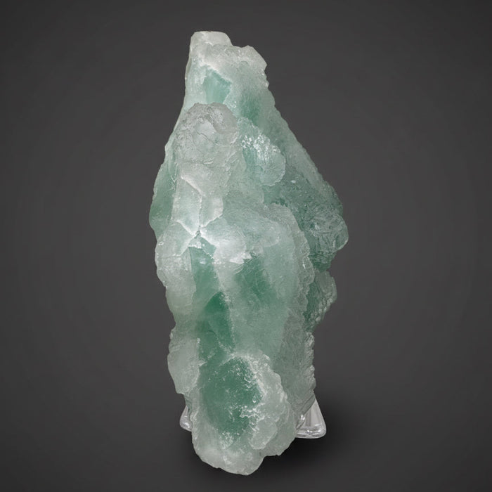 Green crystal fluorite on a dark gray background
