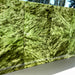 Green jade slab with a textured pattern on a white surface