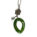 Green jade pendant on a silver chain against a white background