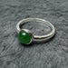 Silver ring with a green jade gemstone