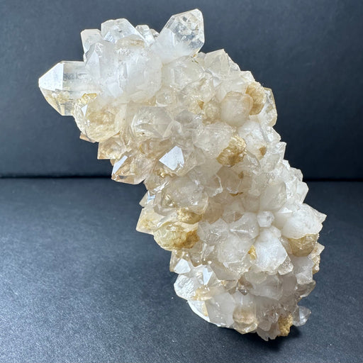 Crystal cluster on a dark gray background