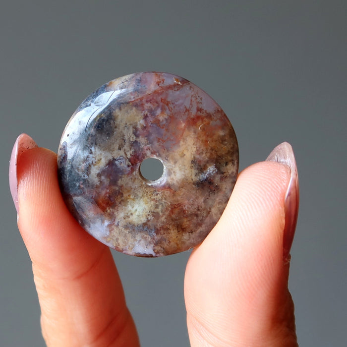 red moss agate donut stone