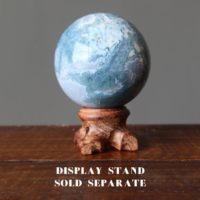 light green moss agate sphere on stand