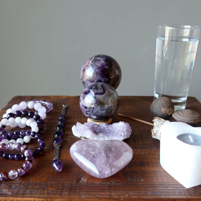 amethyst stones, moqui marbles, water