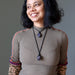 woman wearing two amethyst macrame necklaces