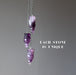 three amethyst pendulums
