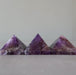 three amethyst pyramids