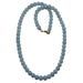 Light blue Angelite beaded necklace on a white background