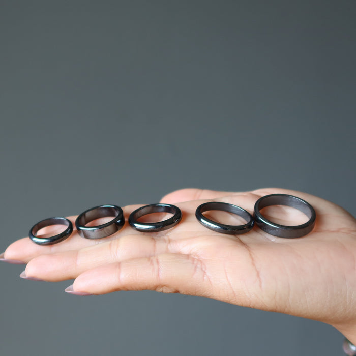 hematine rings in palm of hand