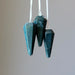 3 bloodstone pendulums