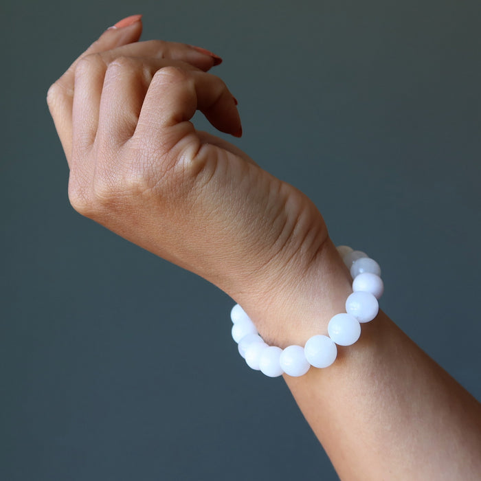 pink mangano calcite bracelet on wrist