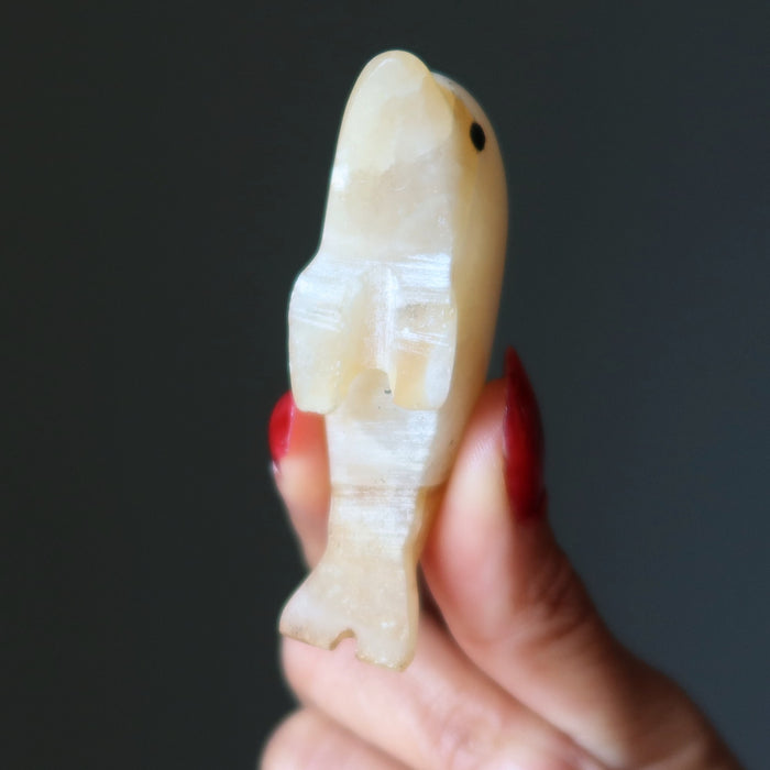 yellow calcite dolphin