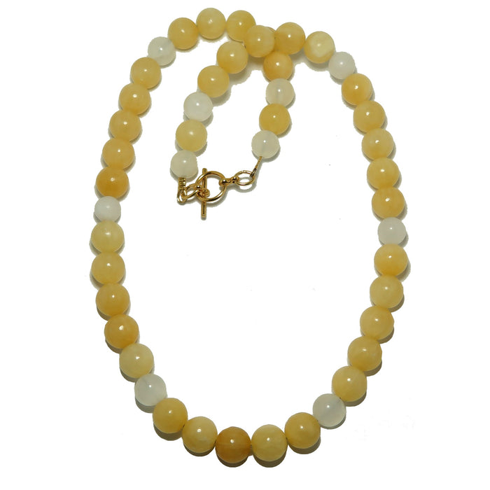 Calcite Necklace with yellow and white beads on a white background
