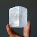 optical calcite crystal in hand
