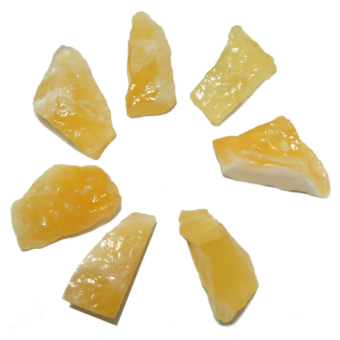 7 rough yellow calcite stones