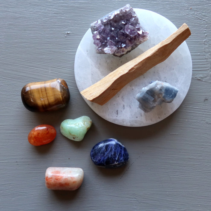 chakra stones and palo santo