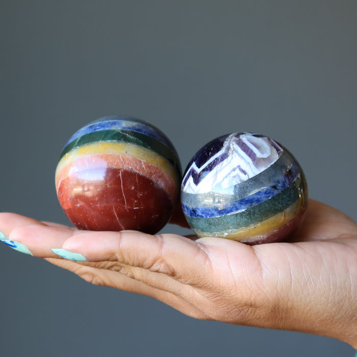 two chakra spheres in hand