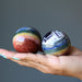 two chakra spheres in hand