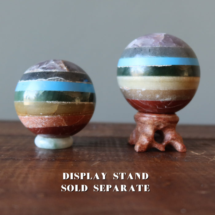 layered chakra spheres on display stands