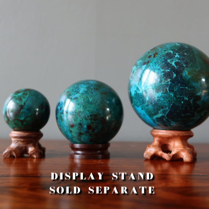 chrysocolla spheres on display stands