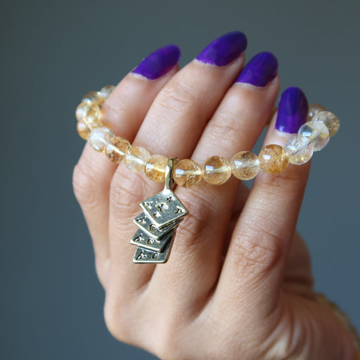 citrine bracelet with four aces charm