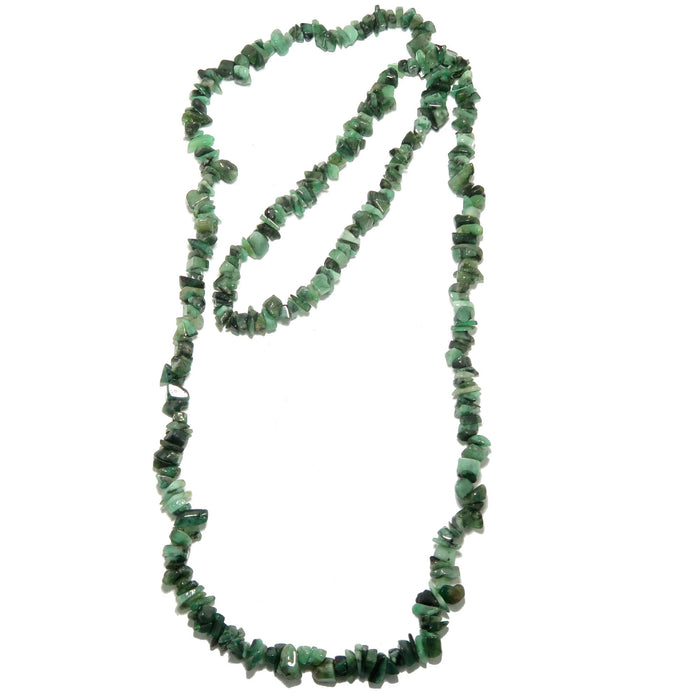 Green emerald stone necklace on a white background