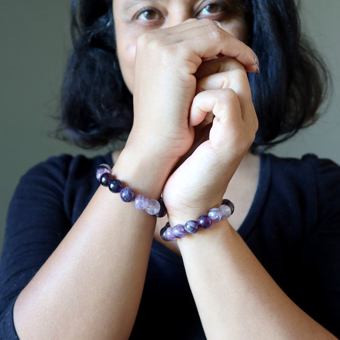 woman wearing purple fluorite bracelets