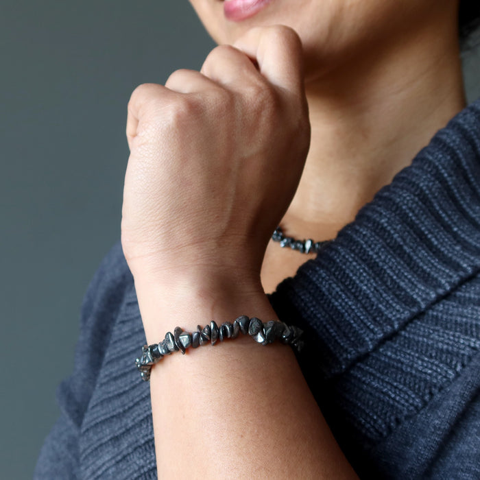 hematite bracelet and necklace on woman