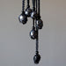 6 hematite tumbled stones in macrame necklaces