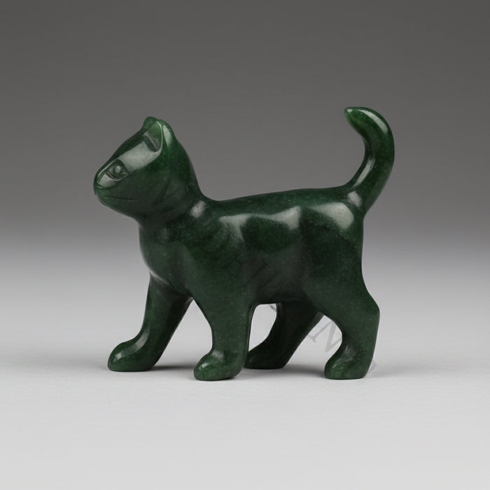 Green jade cat-shaped object on a white background