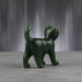 Green jade cat sculpture on a white background