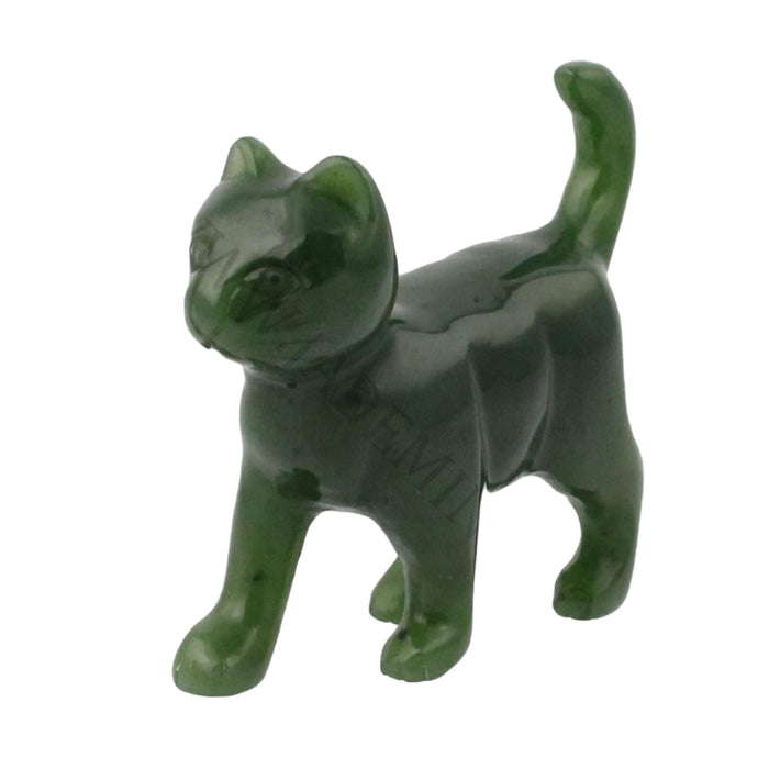 Green jade cat figurine on a white background